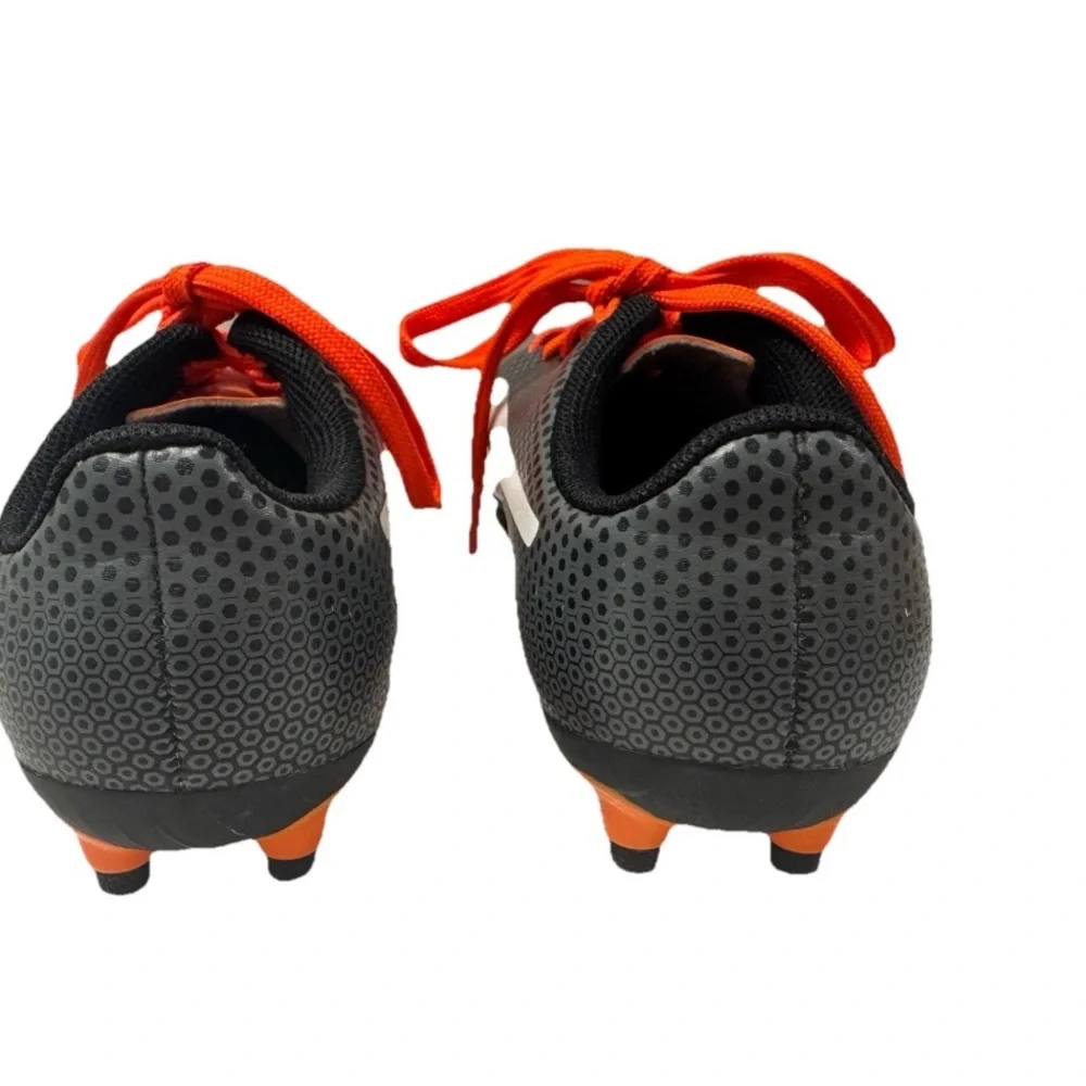PUMA Kid’s Cleats in orange‎ and black